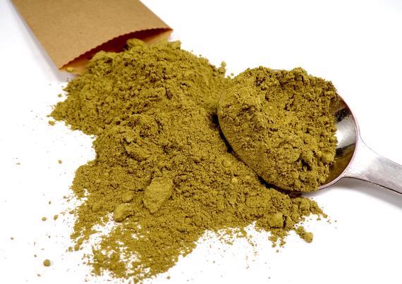 Henna powder on a spoon